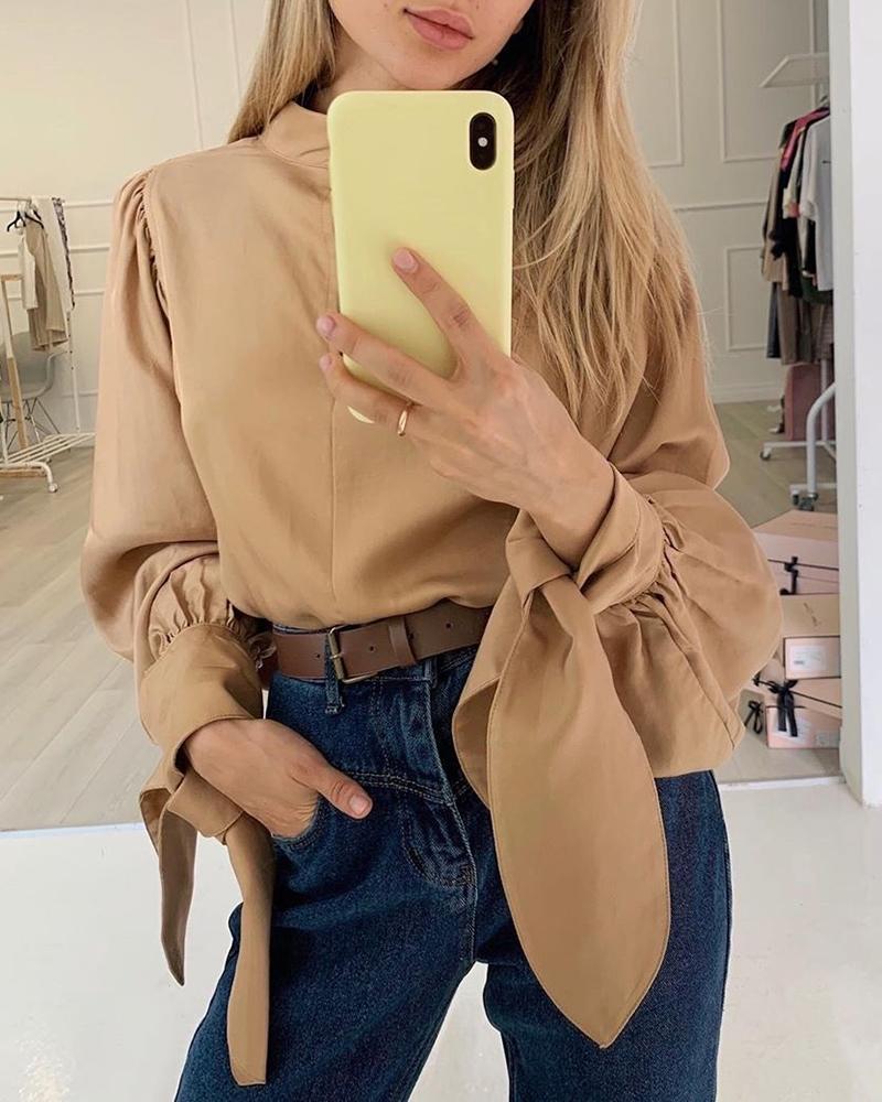 

Solid Mock Neck Tied Lantern Sleeve Blouse