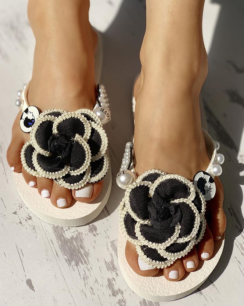 

Flower Embellished Toe Post Flat Sandals