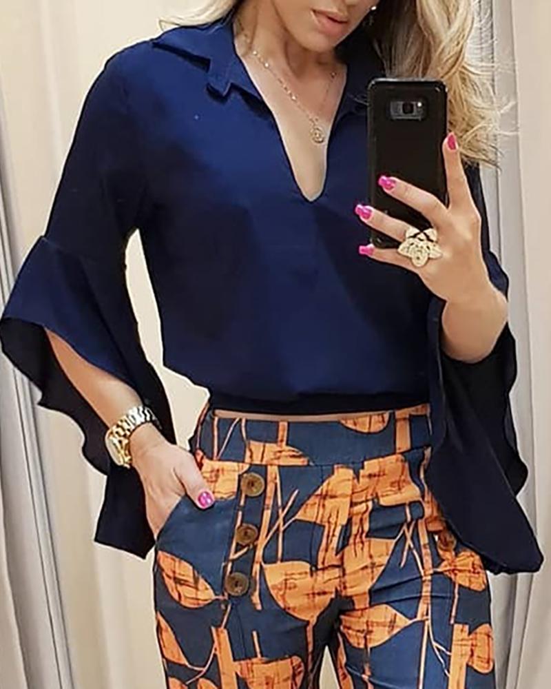 

Ruffles Bell Sleeve Slit Back Blouse