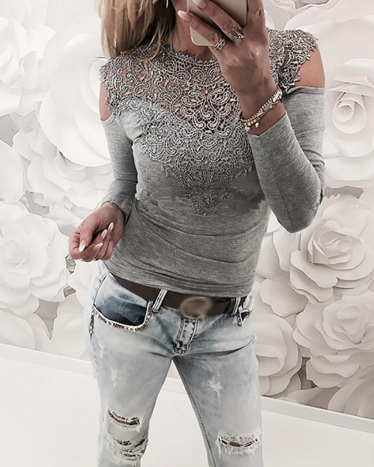 

Appliqued Hollow Out Splicing Blouse