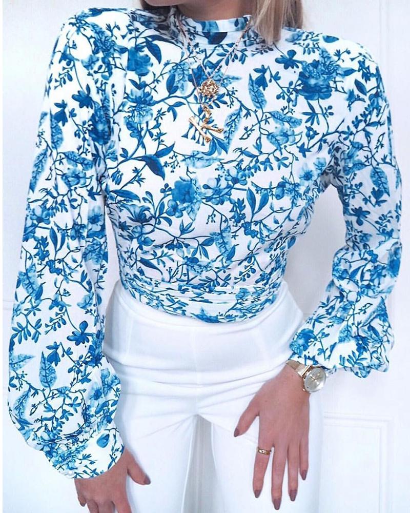 

Mock Neck Backless Tied Porcelain Print Ruched Blouse