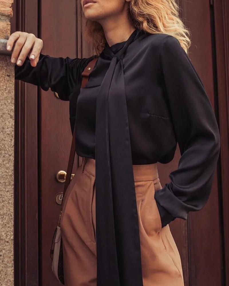 

Solid High Neck Tied Lantern Sleeve Blouse