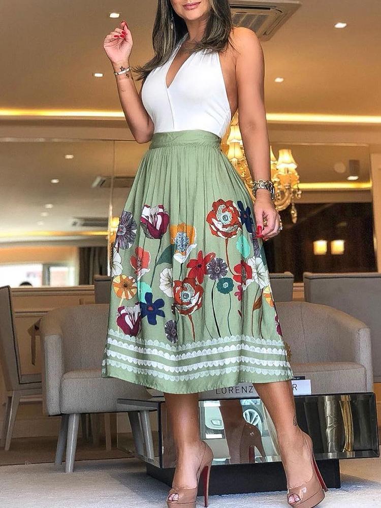 

Solid Halter Top With Floral Print Skirt Sets